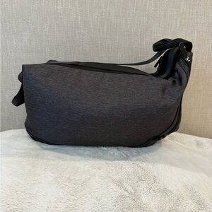 **Lolë Convertible Shoulder Bag / Backpack – Versatile Everyday Bag**